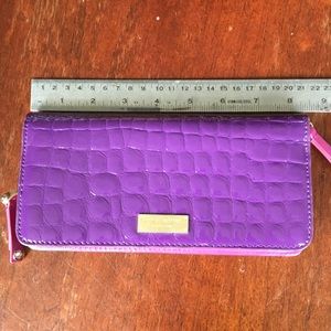 Henri Bendel purple patent leather wallet